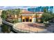 Stunning clubhouse exterior with water features, mature landscaping, and a circular driveway at 12544 Floridays Resort Dr # 507-B, Orlando, FL 32821
