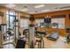 Well-equipped gym featuring modern fitness machines and mounted televisions at 12544 Floridays Resort Dr # 507-B, Orlando, FL 32821