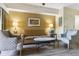 Inviting living room featuring a comfortable sofa, armchairs, and stylish decor at 12544 Floridays Resort Dr # 507-B, Orlando, FL 32821
