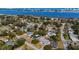 A picturesque aerial shot highlights a charming residential community by the water at 1705 Cordova Ave, Daytona Beach, FL 32117