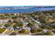 An elevated view showcases a waterfront neighborhood with lush greenery and a mix of housing styles at 1705 Cordova Ave, Daytona Beach, FL 32117