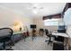 Inviting bedroom with a decorative lamp, neutral walls, and space for a desk at 1705 Cordova Ave, Daytona Beach, FL 32117