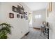 Inviting foyer with a decorative glass table and carpet at 1705 Cordova Ave, Daytona Beach, FL 32117