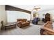 Cozy living room with ample seating and a ceiling fan at 1705 Cordova Ave, Daytona Beach, FL 32117