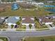 An aerial view of single-Gathering homes with manicured lawns in a well-planned community at 243 Island Breeze Ave, Daytona Beach, FL 32124