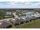 Aerial view showcasing the home's proximity to a lake and community amenities at 243 Island Breeze Ave, Daytona Beach, FL 32124