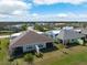 This aerial view shows the home's backyard and screened in lanai at 243 Island Breeze Ave, Daytona Beach, FL 32124