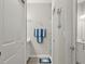 Well-lit bathroom with double sinks and white cabinets at 3411 Gallia St, New Smyrna Beach, FL 32168