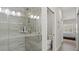 Walk-in shower with glass doors and tile surround at 3411 Gallia St, New Smyrna Beach, FL 32168