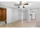 Open-concept living room featuring tiled floors and access to the kitchen at 630 W Rich Ave, Deland, FL 32720