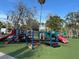 Colorful playground with slides, climbing structures, and platforms for play at 66 Old Sunbeam Dr, South Daytona, FL 32119