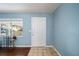 Welcoming entryway with tile flooring and natural light from the front window at 8885 Sw 95Th St # C, Ocala, FL 34481