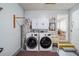 Laundry room with a washer, dryer, and utility sink at 8885 Sw 95Th St # C, Ocala, FL 34481