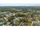 An aerial view of a residential area with many trees at 1054 W Samms Ave, Port Orange, FL 32129
