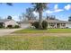 Charming single-story home featuring a well-maintained lawn and inviting curb appeal at 1054 W Samms Ave, Port Orange, FL 32129
