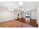 Spacious living room featuring tile and laminate flooring and sliding door access to the outside at 1054 W Samms Ave, Port Orange, FL 32129