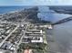 Aerial view of waterfront condo buildings with pools and river access at 118 S Halifax Ave # 103, Daytona Beach, FL 32118