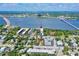 Aerial view of the condo property with a tranquil waterway nearby at 118 S Halifax Ave # 103, Daytona Beach, FL 32118