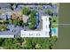 Overhead view of condo buildings with parking, pool, and river access at 118 S Halifax Ave # 103, Daytona Beach, FL 32118