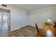 Bright bedroom featuring a spacious closet and wood flooring, perfect for a home office at 118 S Halifax Ave # 103, Daytona Beach, FL 32118