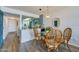 Dining room area with open concept and views of the kitchen at 118 S Halifax Ave # 103, Daytona Beach, FL 32118