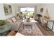 Living room boasting contemporary furnishings and a view of the water at 118 S Halifax Ave # 103, Daytona Beach, FL 32118