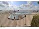 Waterfront community pool and seating with a bright warning sign at 118 S Halifax Ave # 103, Daytona Beach, FL 32118