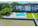 Inviting waterfront pool area with ample lounge seating at 118 S Halifax Ave # 103, Daytona Beach, FL 32118