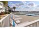 Relaxing outdoor pool with lounge chairs and a beautiful waterfront view at 118 S Halifax Ave # 103, Daytona Beach, FL 32118
