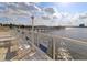 Inviting outdoor pool with lounge chairs, umbrellas and scenic waterfront views at 118 S Halifax Ave # 103, Daytona Beach, FL 32118
