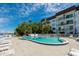 A beautiful, modern condominium building with an in-ground swimming pool and waterfront views at 118 S Halifax Ave # 103, Daytona Beach, FL 32118