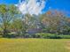 Picturesque community entrance with brick signage and manicured landscaping at 1187 Athlone Way, Ormond Beach, FL 32174