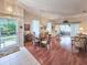 Inviting living room and dining area with hardwood floors and natural light at 1187 Athlone Way, Ormond Beach, FL 32174
