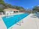 Inviting community pool featuring ample space for relaxing and socializing at 1187 Athlone Way, Ormond Beach, FL 32174