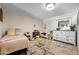 Bedroom with a large window, natural light and neutral decor at 2301 S Atlantic Ave # 230, Daytona Beach, FL 32118