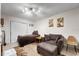 Cozy bedroom features a comfortable chair, throw pillows, and beach themed artwork at 2301 S Atlantic Ave # 230, Daytona Beach, FL 32118