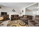 Comfortable living room with two couches, a tv, and glass block feature at 2301 S Atlantic Ave # 230, Daytona Beach, FL 32118