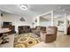 Cozy living room with carpet, comfortable furnishings, and neutral decor at 2301 S Atlantic Ave # 230, Daytona Beach, FL 32118