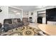 Open-concept living space with tile floors, comfortable seating, and modern décor at 2301 S Atlantic Ave # 230, Daytona Beach, FL 32118