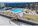 Exterior view of pool with lounge chairs and umbrellas near the beach at 2301 S Atlantic Ave # 230, Daytona Beach, FL 32118