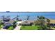 Waterfront home with private boat docks, lush landscaping, and a convenient carport at 2912 River Point Dr, Daytona Beach, FL 32118