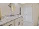 Bright bathroom with white cabinets, granite countertop sink, and modern faucet at 2912 River Point Dr, Daytona Beach, FL 32118