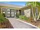 Gorgeous stone home featuring a stone walkway to the glass double-door entrance at 2912 River Point Dr, Daytona Beach, FL 32118