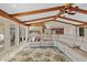 Spacious living room with exposed wood beams, lots of natural light, and an open floorplan at 2912 River Point Dr, Daytona Beach, FL 32118