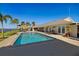 Stunning pool overlooking the water, featuring a tiki hut and lounge chairs at 2912 River Point Dr, Daytona Beach, FL 32118