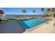 Sparkling pool with a clear view of the waterfront and private dock at 2912 River Point Dr, Daytona Beach, FL 32118