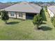 Aerial view of home featuring a lawn and mature trees at 3257 Bailey Ann Dr, Ormond Beach, FL 32174
