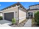 Stylish one-story home showcasing modern architectural elements, neutral color scheme, and well-maintained landscaping at 3257 Bailey Ann Dr, Ormond Beach, FL 32174