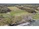 Scenic view of the golf course and the surrounding trees at 3257 Bailey Ann Dr, Ormond Beach, FL 32174