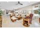 An open-concept living room flows into the dining area and kitchen, creating a harmonious living space at 3257 Bailey Ann Dr, Ormond Beach, FL 32174